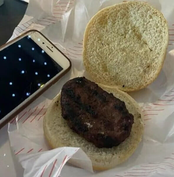 A Burger That Is Just a Burnt Patty With Nothing Else